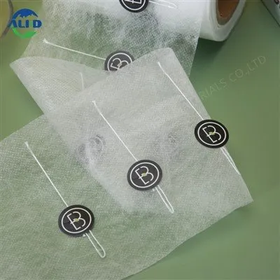 لفة قماش غير منسوجة PLA من الفئة الغذائية مع ملصق وخيط لأكياس القهوة والشاي